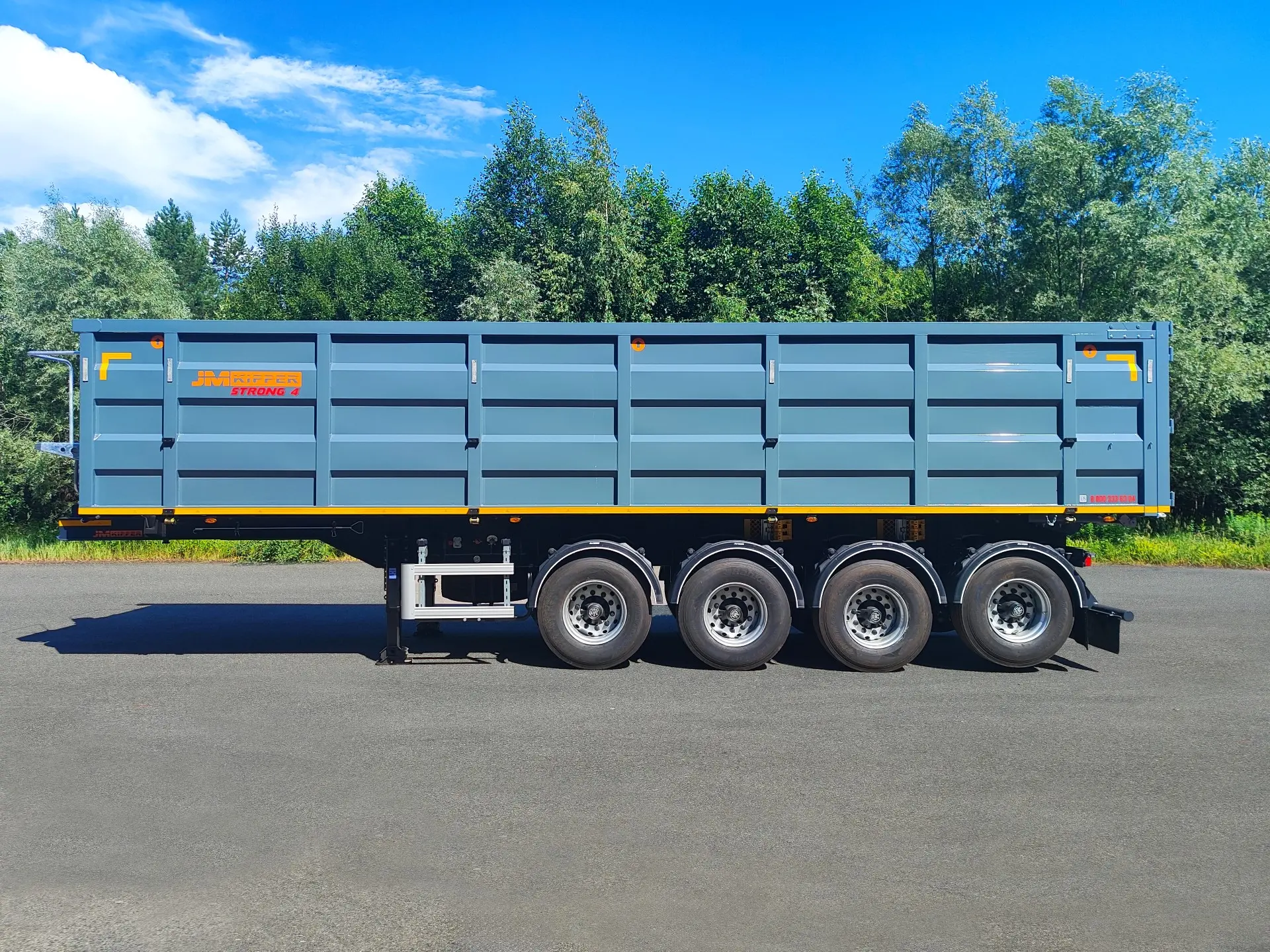 Стальной самосвальный четырехосный полуприцеп JM Kipper STRONG 4 (бок)